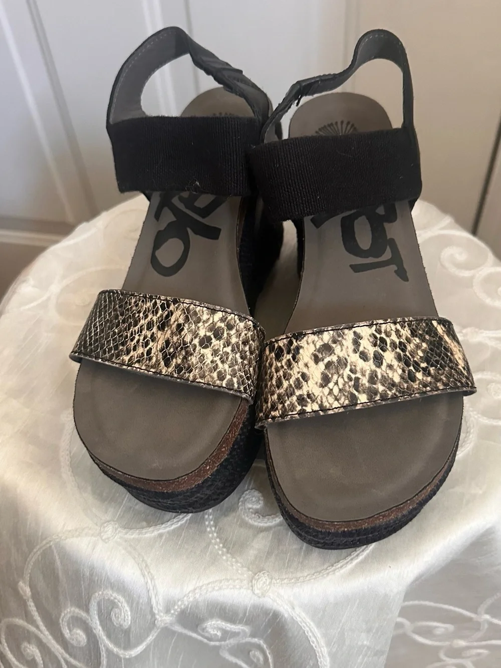 OTBT Black Elastic Wedge Sandals with Metallic Snake-Print Strap